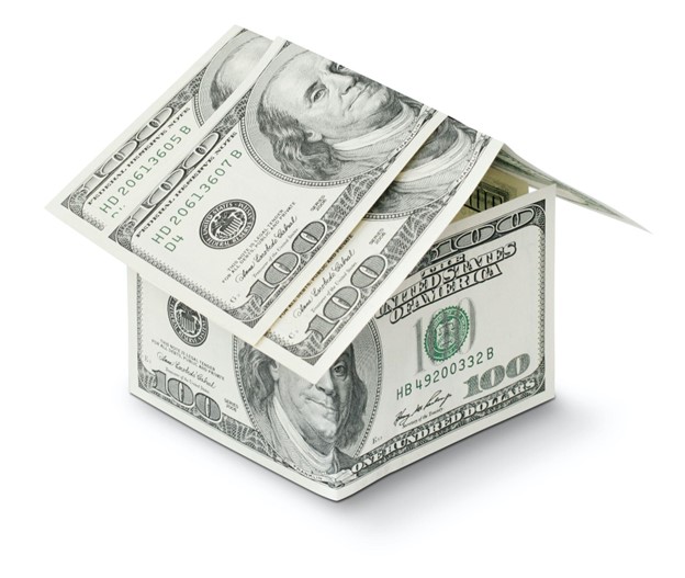 Several one-hundred-dollar bills folded into a house shape, Merchant Cash Advance Works
