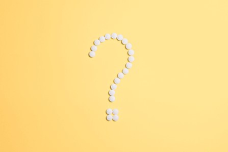 A white question mark on a yellow background, Merchant Cash Advance Works