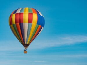 Exterior view of a hot air balloon in the sky Rates Hikes