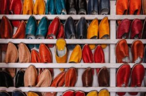Shelves full of brightly colored shoes