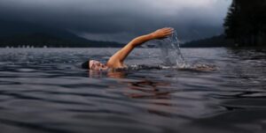 Person swimming in a lake Active Investor