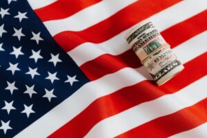 A roll of dollars on the American flag U.S. Dollar