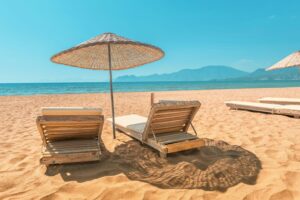 Exterior, two sun loungers on a golden sandy beach, for “How Tech Professionals Can Build Wealth with the SV Mid-Term Note D”
